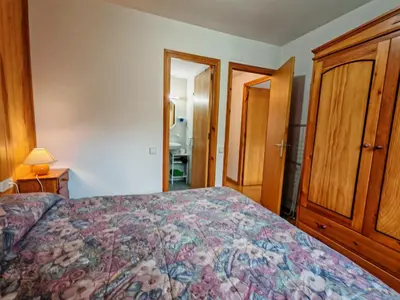 Cama o camas de una habitación en Chimenea, terraza y parking- Tu refugio acogedor - Besiberri 3