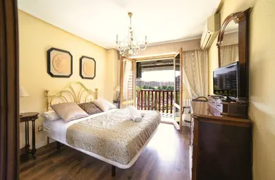 Cama o camas de una habitación en La Elegancia del Centro by Alogest