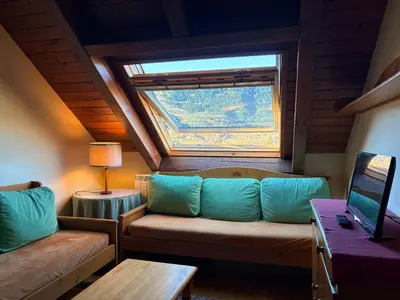 Zona de estar de Triplex espectacular- Comodidad, fuego y vistas - Erta 8