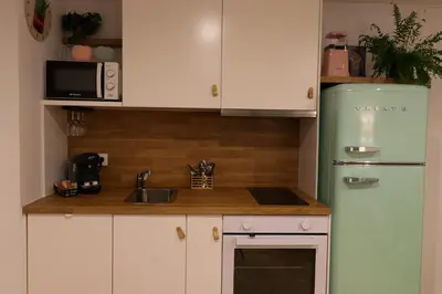 Una cocina o zona de cocina en Apartamentos Abadía.