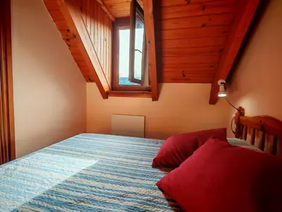 Cama o camas de una habitación en Dúplex rústico familiar- Amplitud y vistas espectaculares - Cuc 2