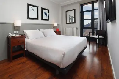 Cama o camas de una habitación en HG Cerler