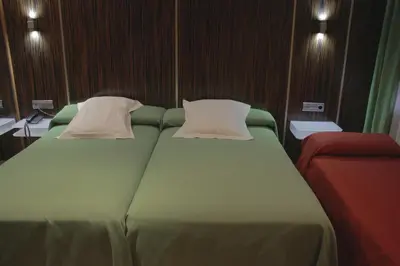 Cama o camas de una habitación en Hotel Gran Via