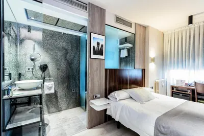 Cama o camas de una habitación en Hotel Gran Via