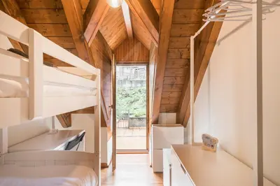 Cama o camas de una habitación en Casa Montjòia by SeaMount Rentals