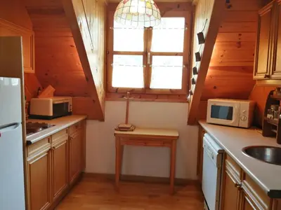 Una cocina o zona de cocina en Madera y espacio, tu dúplex funcional para famílias - Muntanyó 2