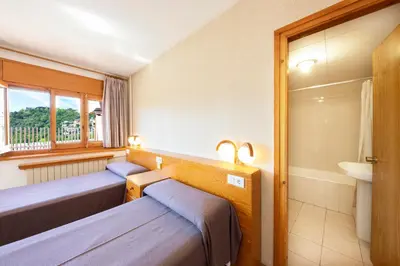 Cama o camas de una habitación en Hotel Restaurante La Glorieta