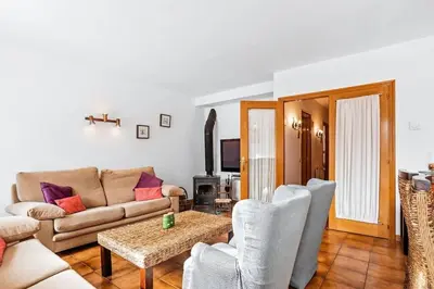 Zona de estar de Casa Maite by Cardi Suit