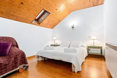 Cama o camas de una habitación en Casa Maite by Cardi Suit