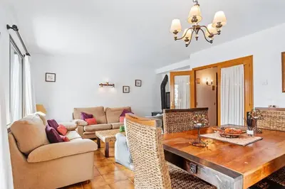 Zona de estar de Casa Maite by Cardi Suit
