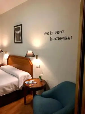 Cama o camas de una habitación en Hotel Hispania