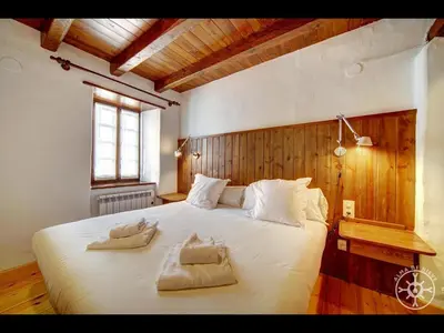 Cama o camas de una habitación en CASA PINS de Alma de Nieve