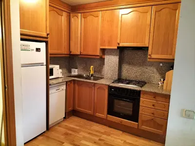 Una cocina o zona de cocina en Esquía en Baqueira o Espot y visita Aigüestortes y alrededores