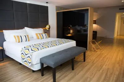 Cama o camas de una habitación en Hotel Tres Reyes Pamplona