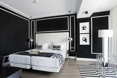 Cama o camas de una habitación en Hotel Tres Reyes Pamplona