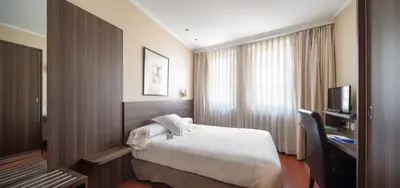 Cama o camas de una habitación en Hotel Yoldi