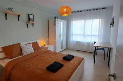 Cama o camas de una habitación en Piso acogedor en los Pirineos