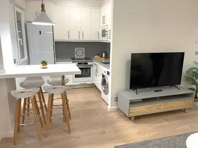 Una cocina o zona de cocina en Apartamento céntrico patio chill out-Prime video