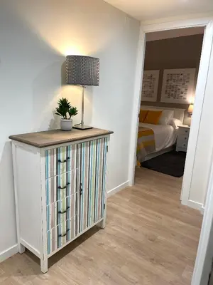 Cama o camas de una habitación en Apartamento céntrico patio chill out-Prime video