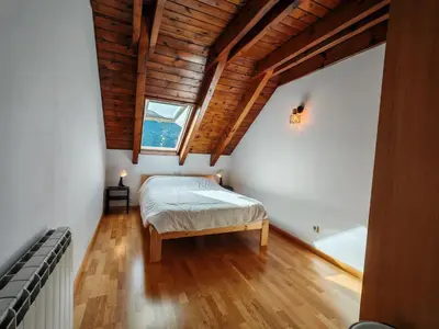 Cama o camas de una habitación en Tu dúplex luminoso con vistas y confort - Erta 12