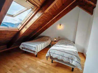Cama o camas de una habitación en Tu dúplex luminoso con vistas y confort - Erta 12