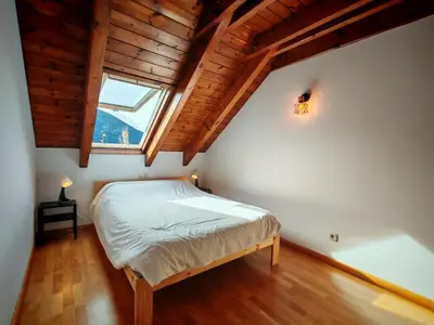 Cama o camas de una habitación en Tu dúplex luminoso con vistas y confort - Erta 12