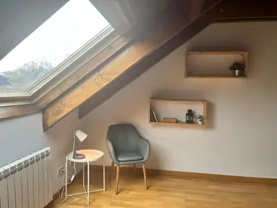 Zona de estar de Tu dúplex luminoso con vistas y confort - Erta 12