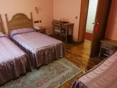 Cama o camas de una habitación en Hotel Xabier