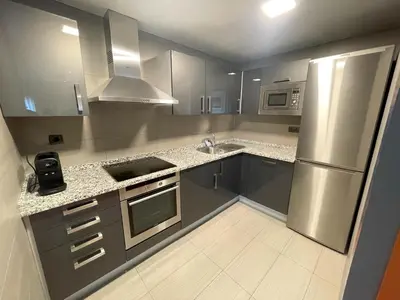 Una cocina o zona de cocina en Hotel Apartamentos San Fermín Pamplona