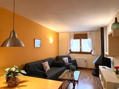 Una televisión o centro de entretenimiento en Apartament Boet - Ainet de Cardós - L'Amfitriona
