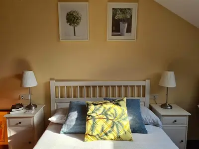 Cama o camas de una habitación en El ático de la Gorga