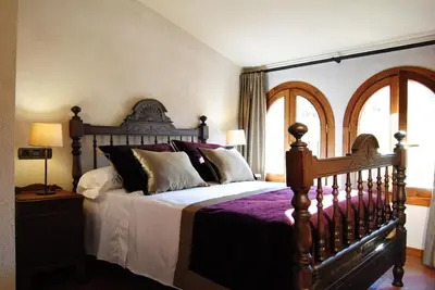 Cama o camas de una habitación en Cal Porxo del Priorat