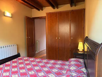 Cama o camas de una habitación en Triplex rústico, chimenea, esquí y vistas magníficas - Erta 4