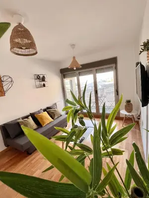 Una televisión o centro de entretenimiento en Apartamento Vive Zaragoza IV