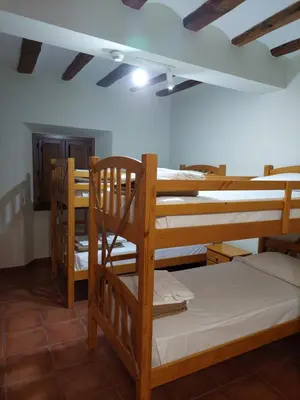 Cama o camas de una habitación en ALBERGUE CASA LAS ANGELITAS