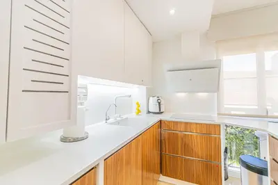 Una cocina o zona de cocina en Acogedor apartamento con acabados primera calidad