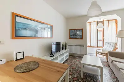 Una televisión o centro de entretenimiento en Apartamento CityCenter Tudela