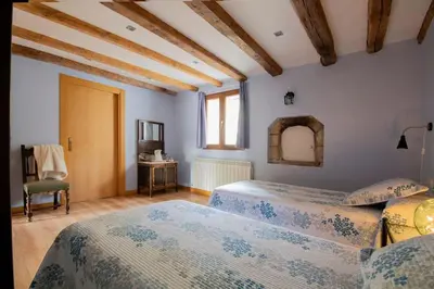 Cama o camas de una habitación en Casa rural Enekoizar