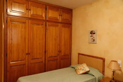 Cama o camas de una habitación en Ca l'Esteve