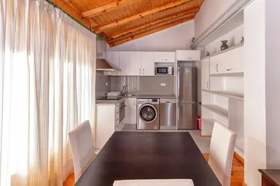 Una cocina o zona de cocina en Apartamento Los 3 Reyes