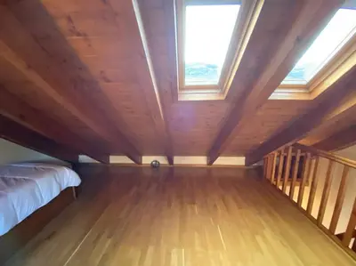 Cama o camas de una habitación en Apartamento familiar en Benasque