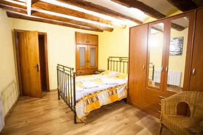 Cama o camas de una habitación en CASA CARRANCLANC