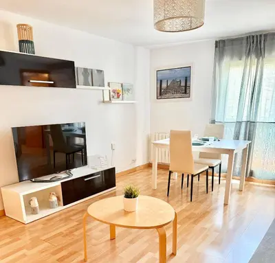 Una televisión o centro de entretenimiento en Apartamento Ramon Pignatelli