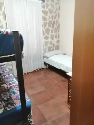 Cama o camas de una habitación en Can Marisa