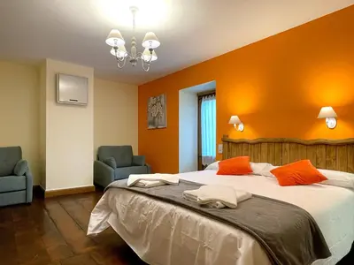 Cama o camas de una habitación en CASA RURAL ERVITENA