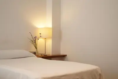 Cama o camas de una habitación en Hotel El Patiaz de la Reina Rana