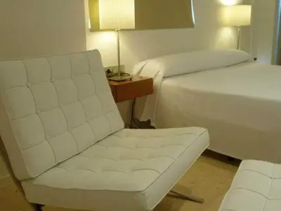 Cama o camas de una habitación en Hotel El Patiaz de la Reina Rana