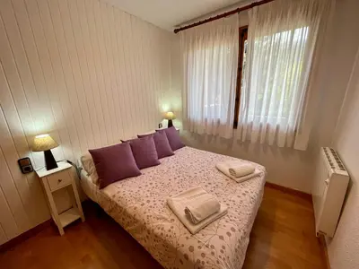 Cama o camas de una habitación en C20 - Alojamiento en Edif. Pirineos Cerler - Villmor