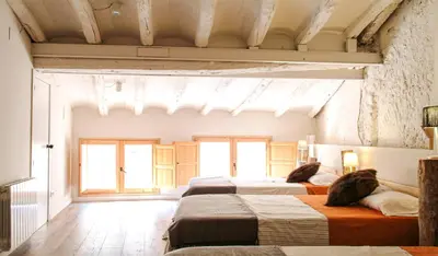 Cama o camas de una habitación en Clauhomes Galliner de Tarres