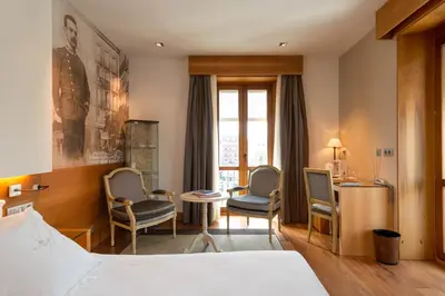 Cama o camas de una habitación en Gran Hotel La Perla